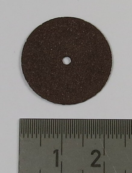 1 Korund-Trennscheibe 22mm Durchmesser.   Ca. 0,7mm dick
